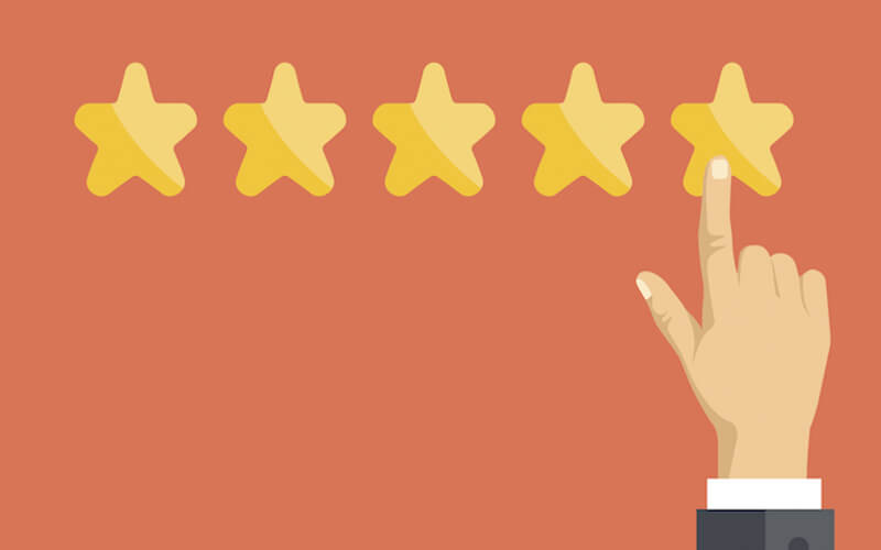 Person selecting a 5 star rating